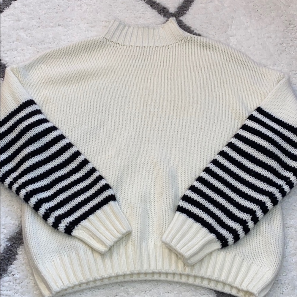 Turtleneck cream sweater